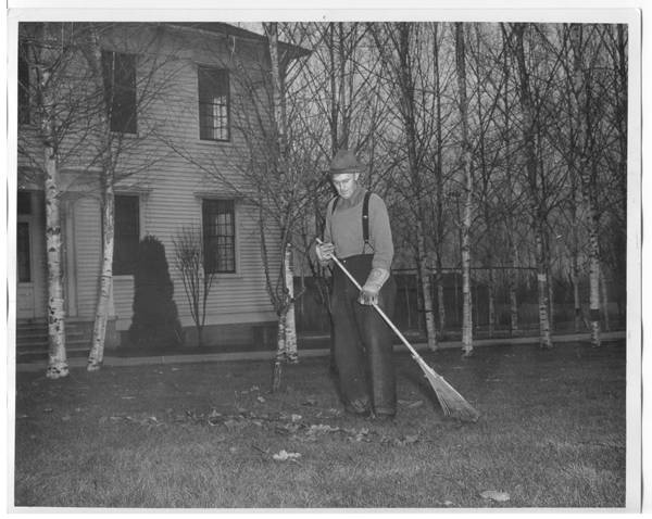 A man raking leaves · heritage